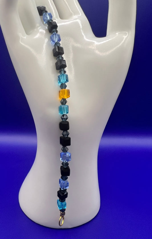Pulsera de Cristal Austriaco Cuentas Cuadradas Azul Claro, Negras y Amarillas